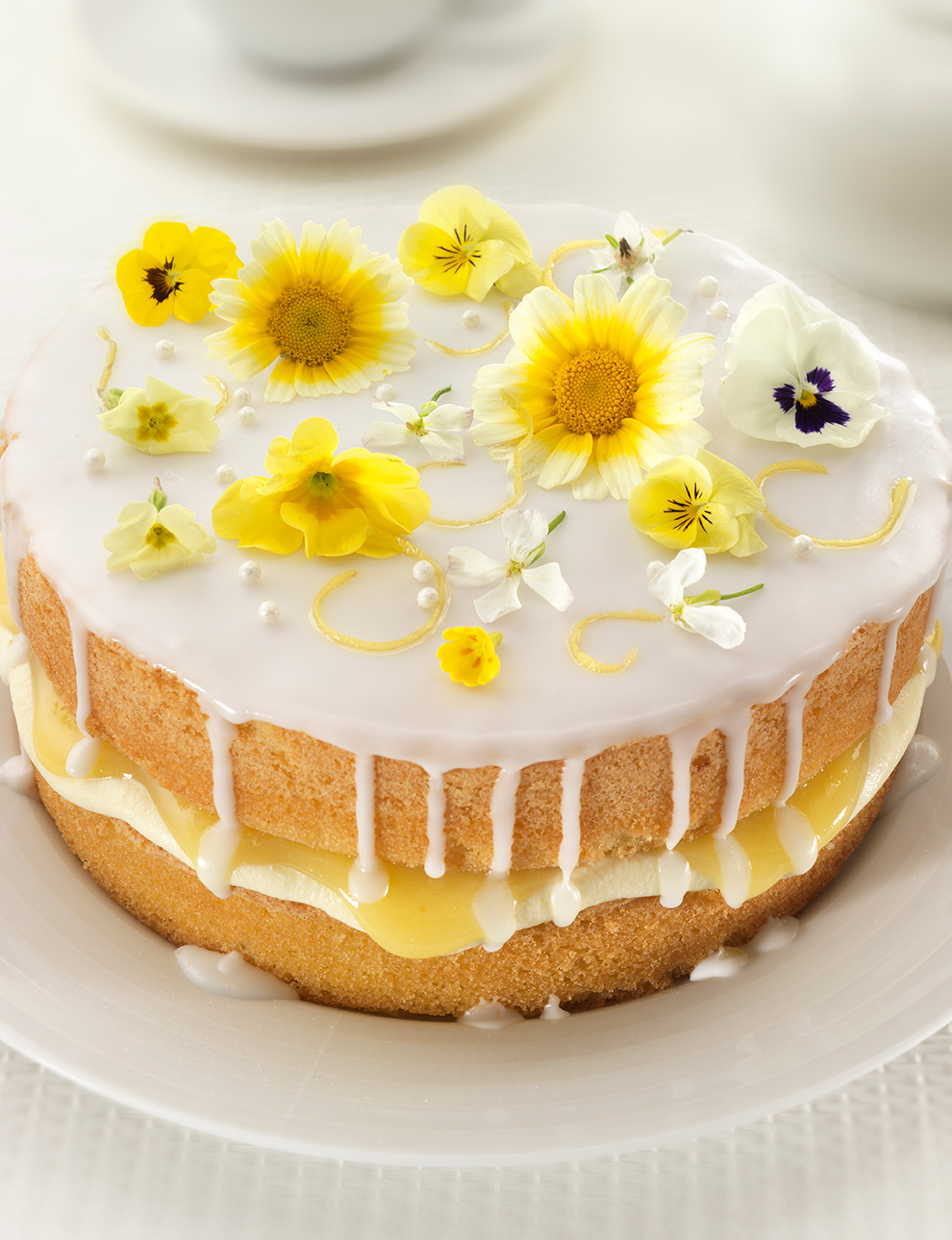 Lemon and elderflower drizzle cake Sainsburys Magazine